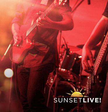 Band playing a Sunset Live! session on the Promenade Plaza Stage.