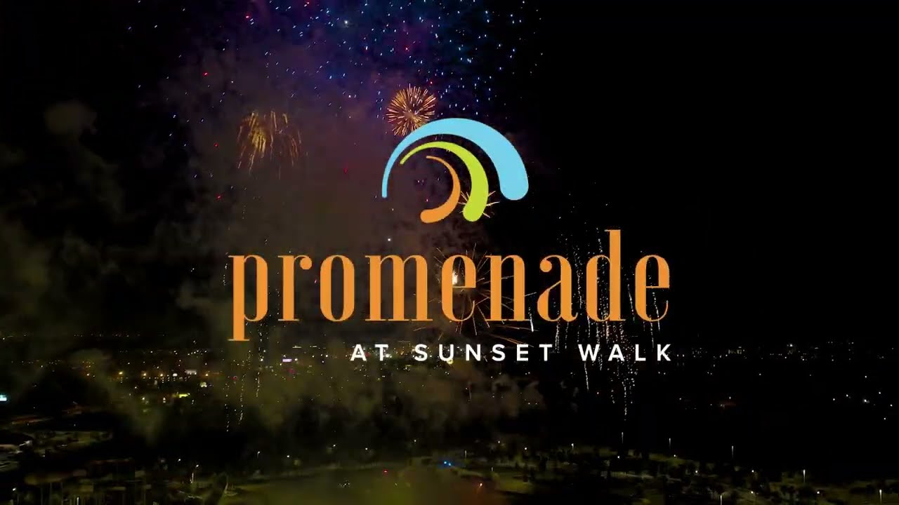 Promenade at Sunset Walk logo over New Year’s Eve fireworks