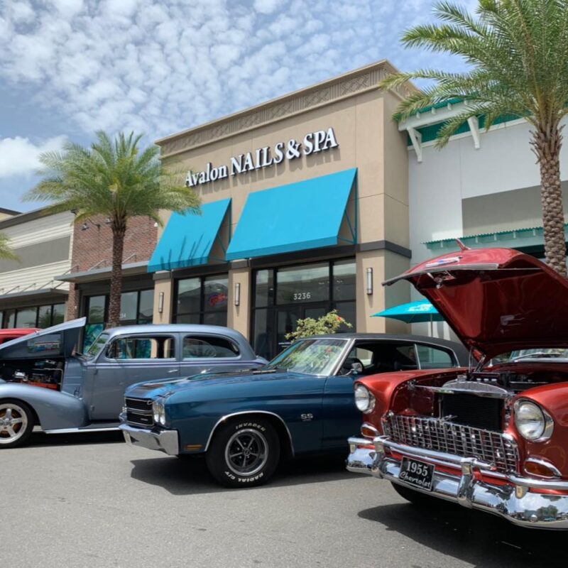 Avalon Nails & Spa storefront with classic cars parked out front