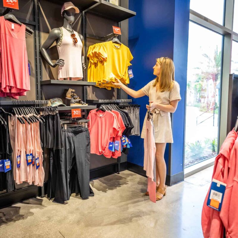 Woman shopping for clothes at Skechers at the Promenade at Sunset Walk