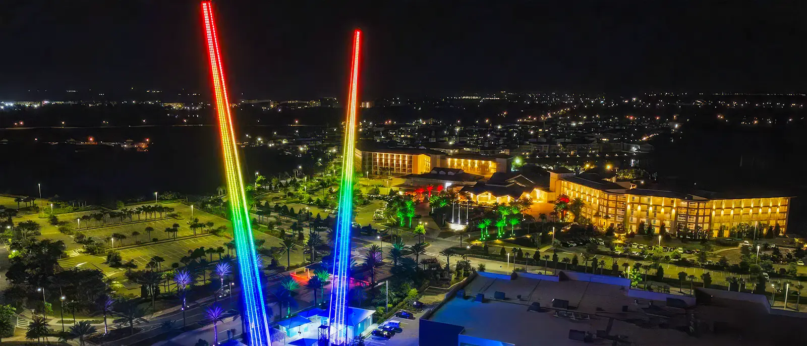 Sunset Walk slingshot lit up in rainbow colors at night