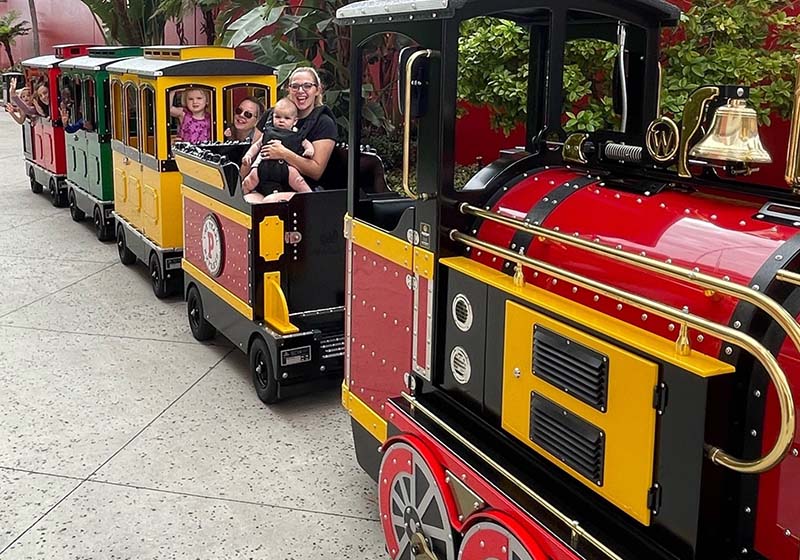 Happy families riding The Pearl Express train
