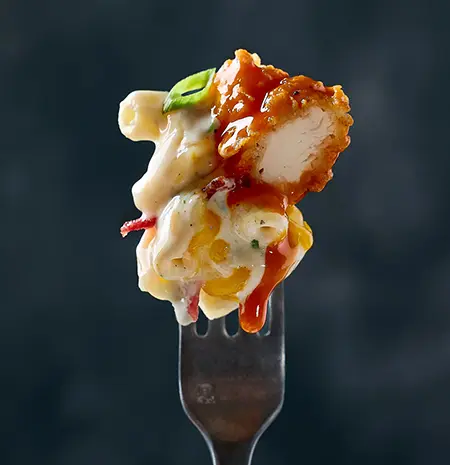 Crispy Buffalo mac-n-cheese from Cowboy Chicken on a fork