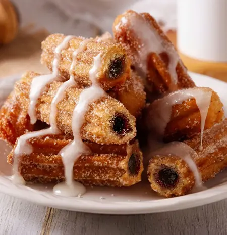 Chocolate-filled cinnamon sugar churros at Cowboy Chicken